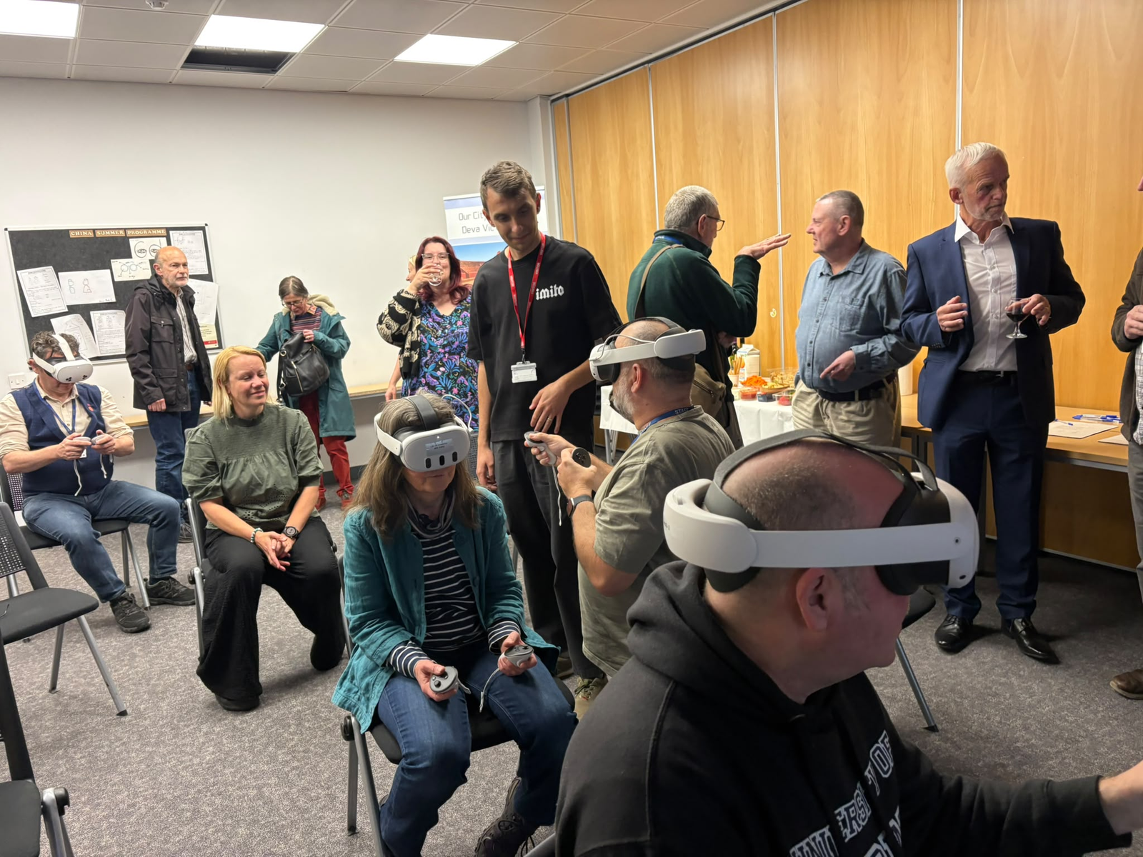 Visitors exploring an IMITO virtual reality experience at a heritage event